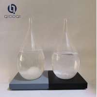 Storm glass with black grey wooden base